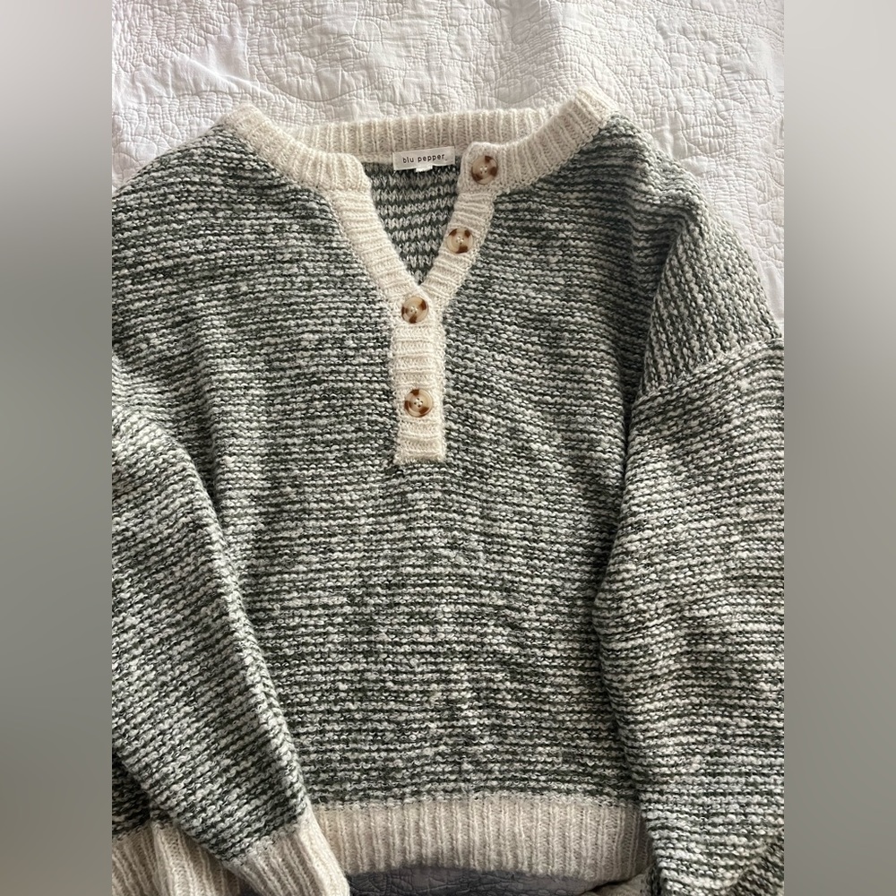 Green and white cardigan sweater